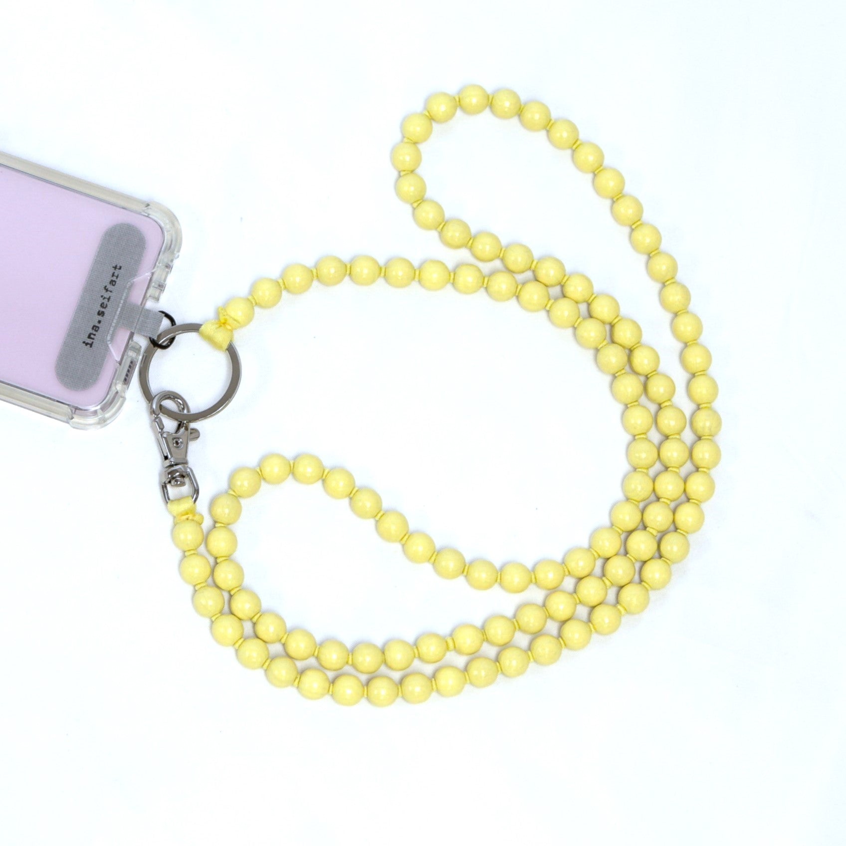 ina seifart pastel yellow phone chain accessory