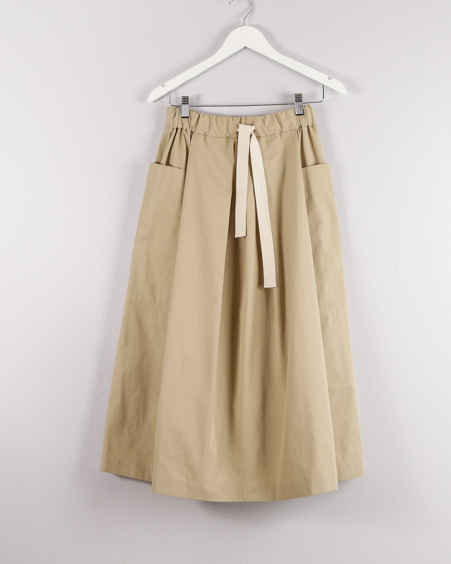 nicholson & nicholson beige cotton midi skirt with drawstring waistband and front pleats